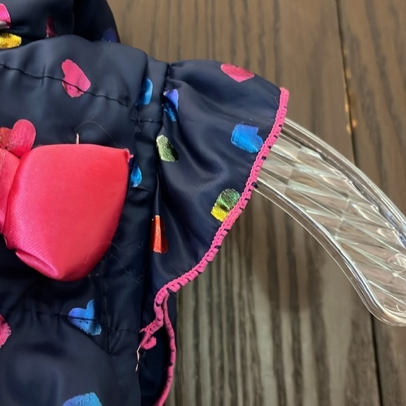 Nannette Kids sleeveless quilted puffer vest. Navy blue with shiny hearts. Size4 - Picture 4 of 8